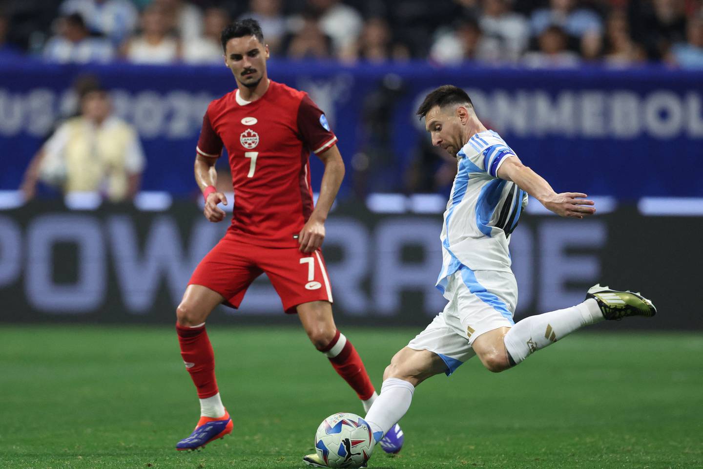 ATLANTA, GEORGIA - JUNE 20: Lionel Messi of Argentina kicks the ball during the CONMEBOL Copa America group A match between Argentina and Canada at Mercedes-Benz Stadium on June 20, 2024 in Atlanta, Georgia.   Todd Kirkland/Getty Images/AFP (Photo by Todd Kirkland / GETTY IMAGES NORTH AMERICA / Getty Images via AFP)