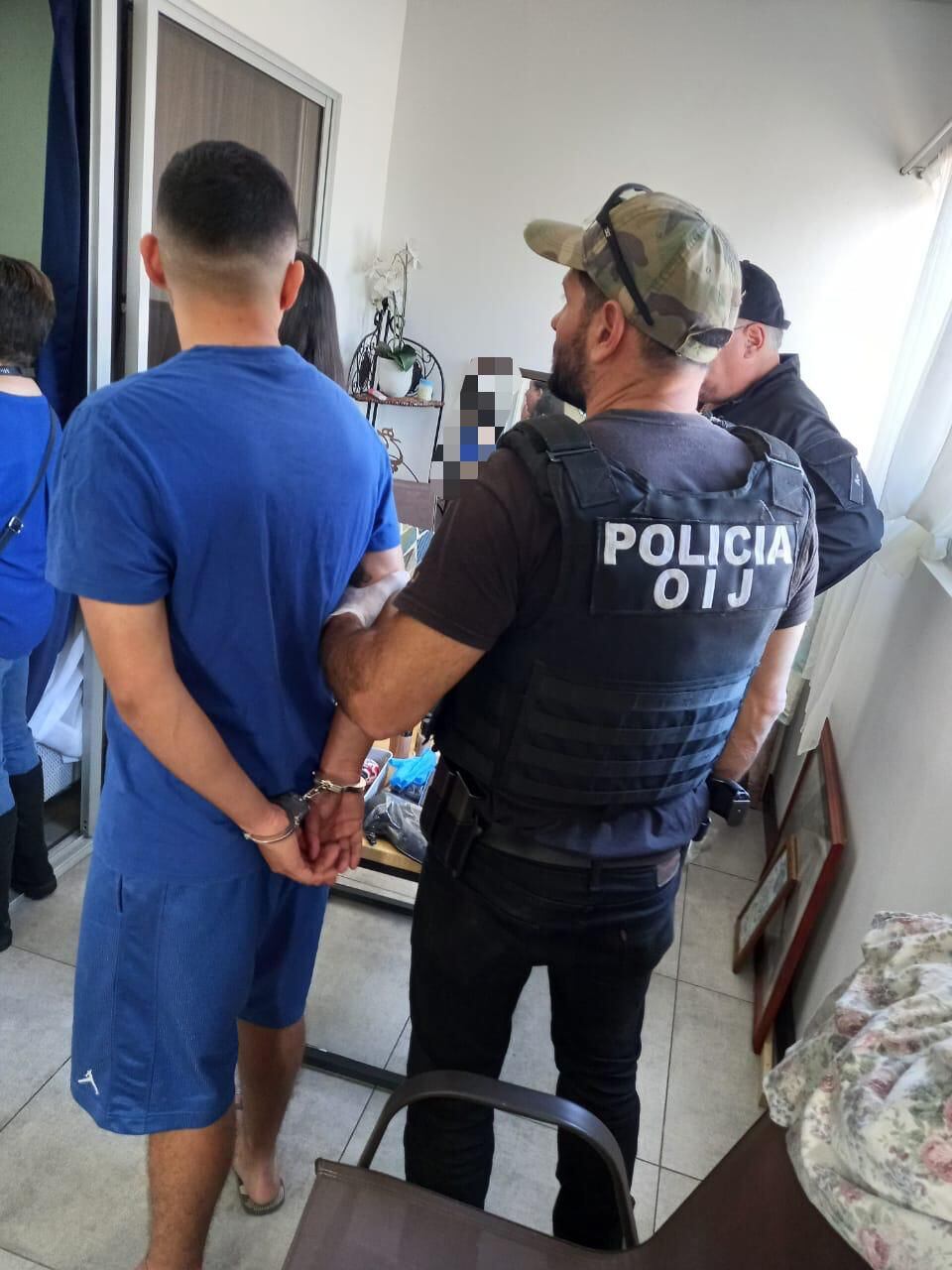 El sujeto fue detenido en una casa en Alajuela. Foto: OIJ.